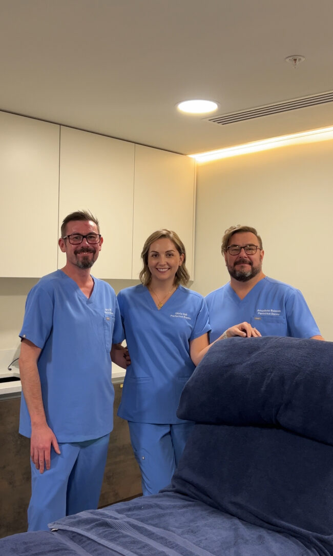 Team photo in scrubs.